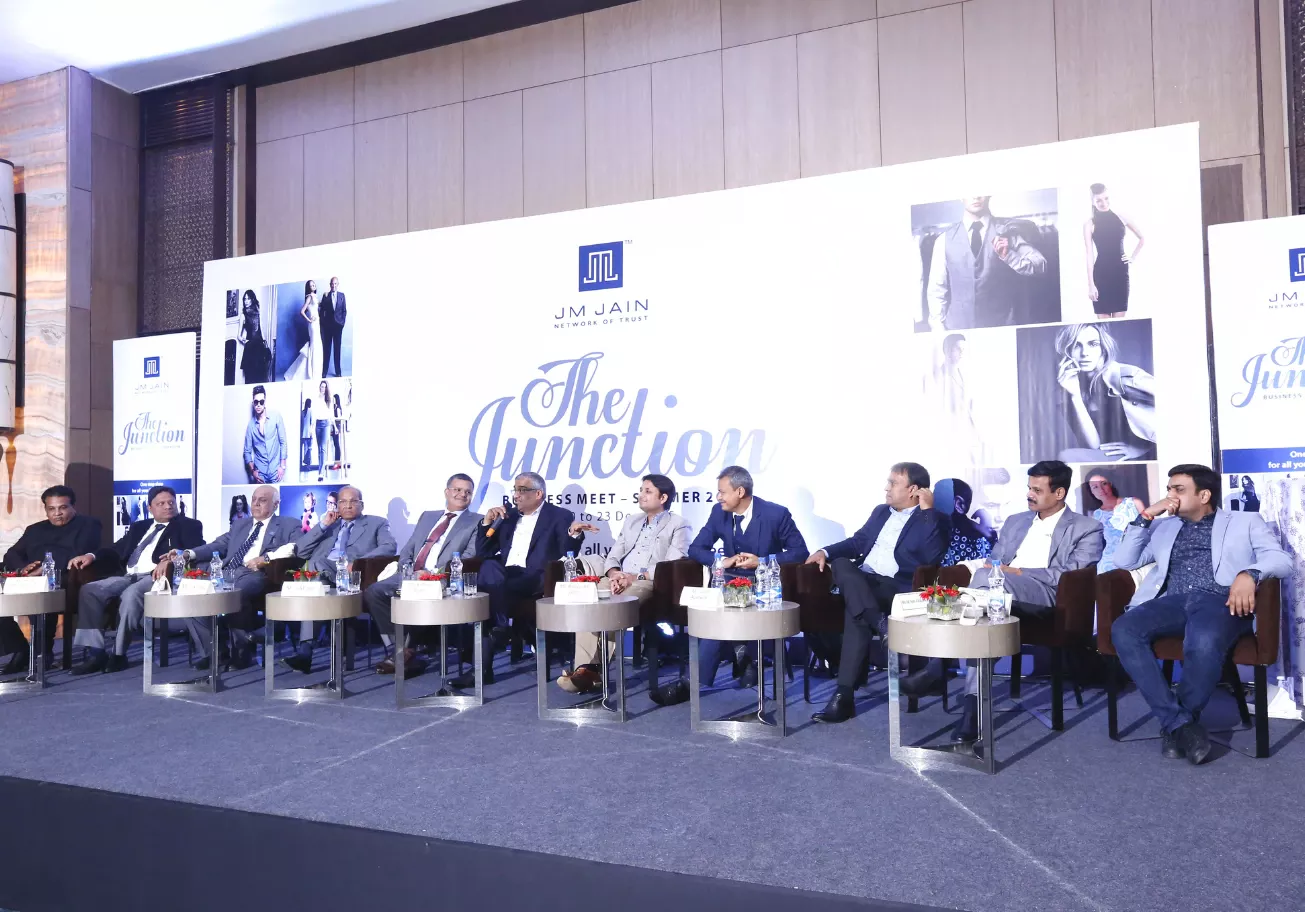 Garment industry pioneers seated on stage at JMJain All India Garment Exhibition 2015
